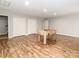 This game room includes a foosball table and lots of open space at 207 Windsor Greene Dr, Monroe, NC 28110