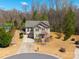 Aerial view of a charming two-story home in a wooded cul-de-sac at 2243 Creek View Ct, Indian Land, SC 29707
