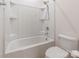 This bathroom offers a shower and tub combination with white fixtures at 2243 Creek View Ct, Indian Land, SC 29707