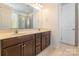 Bathroom featuring double sinks, tile floor, and a door that leads to the shower and bathtub at 2243 Creek View Ct, Indian Land, SC 29707