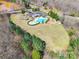 Aerial view of community amenities including a pool, clubhouse, and playground at 2243 Creek View Ct, Indian Land, SC 29707
