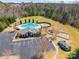 Aerial view of the community pool, clubhouse, and playground at 2243 Creek View Ct, Indian Land, SC 29707