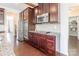 Custom wood cabinets, stainless steel appliances, and countertops in kitchen at 2243 Creek View Ct, Indian Land, SC 29707