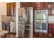 Stainless steel appliances and wood cabinets in kitchen with countertops at 2243 Creek View Ct, Indian Land, SC 29707