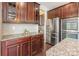 Wood cabinets, stainless steel appliances, and granite countertops in a kitchen at 2243 Creek View Ct, Indian Land, SC 29707