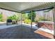 This outdoor patio is covered with a grill and hot tub ready for outdoor living at 2243 Creek View Ct, Indian Land, SC 29707