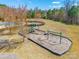 Aerial view of the community playground with swings and a slide at 2243 Creek View Ct, Indian Land, SC 29707