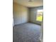 Comfortable bedroom with plush carpeting, neutral paint, and natural light at 24257 Austin Rd, Albemarle, NC 28001