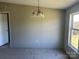 Dining room with neutral walls, carpet, and chandelier at 24257 Austin Rd, Albemarle, NC 28001