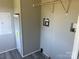 Utility room with a washer/dryer hookups and gray walls at 24257 Austin Rd, Albemarle, NC 28001