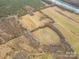 Picturesque aerial view of a large property featuring open fields and mature trees, offering privacy at 2A Riverlane Rd, Rock Hill, SC 29730