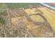 Aerial view of land boasting a combination of fields, woods, and winding roads at 2A Riverlane Rd, Rock Hill, SC 29730