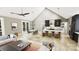 Bright open concept living space with a dining area and kitchen featuring an island at 2A Riverlane Rd, Rock Hill, SC 29730