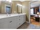 The bathroom includes a double sink vanity with white cabinets, modern fixtures, and ample countertop space at 3196 Stonemill Path, Sherrills Ford, NC 28673