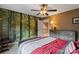 One bedroom features a forest mural wall that adds depth and interest to this comfortable space at 3196 Stonemill Path, Sherrills Ford, NC 28673