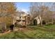 Beautiful two-story home with stone and siding, complemented by professional landscaping at 3196 Stonemill Path, Sherrills Ford, NC 28673