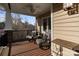 Cozy covered porch with comfortable seating and outdoor decor at 3196 Stonemill Path, Sherrills Ford, NC 28673