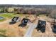 Aerial view of new residential construction homes surrounded by mature trees and landscaping at 4029 Miller Rd, Salisbury, NC 28147