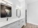 Sleek bathroom featuring double sinks, modern fixtures, and minimalist design at 4029 Miller Rd, Salisbury, NC 28147