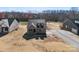 New construction home with gray siding, dormer windows, and a concrete driveway at 4029 Miller Rd, Salisbury, NC 28147