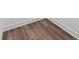 Close-up of wood-look flooring, showing color and design at 4029 Miller Rd, Salisbury, NC 28147