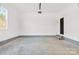 Spacious garage featuring concrete floors, brick steps and a bright window at 4029 Miller Rd, Salisbury, NC 28147