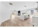 Open concept living space featuring an island, fireplace, and access to a back patio at 4029 Miller Rd, Salisbury, NC 28147