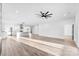 Open living room showcasing modern kitchen with stainless steel appliances and spacious layout at 4029 Miller Rd, Salisbury, NC 28147