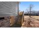 Stairs leading to the backyard and a small wooden door at 4029 Miller Rd, Salisbury, NC 28147