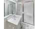 Clean bathroom featuring a modern vanity and a sliding glass door shower, combining style with practicality at 510 Newport Dr, Salisbury, NC 28144