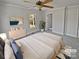Light and airy bedroom featuring a large window, dresser, and a comfortable bed at 510 Newport Dr, Salisbury, NC 28144