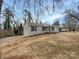 An inviting single-story house with dark shutters and a covered front porch enhances curb appeal at 510 Newport Dr, Salisbury, NC 28144