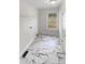 Bright laundry room with marble patterned tile flooring and a large window with natural light at 510 Newport Dr, Salisbury, NC 28144