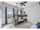 Cozy bedroom with bunk beds, carpet, and a bright window at 6808 Austin Grove Church Rd, Marshville, NC 28103