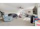 Spacious bonus room with a fan, multiple seating options, and lots of natural light at 6808 Austin Grove Church Rd, Marshville, NC 28103