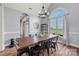 Charming dining room with an arched window, wood floors and space for a large table at 6808 Austin Grove Church Rd, Marshville, NC 28103