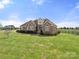 Spacious home featuring a large, green lawn and classic brick architecture at 6808 Austin Grove Church Rd, Marshville, NC 28103