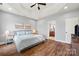 Large main bedroom boasts trey ceilings, wood floors, and ensuite access at 6808 Austin Grove Church Rd, Marshville, NC 28103