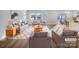 Bright living room featuring a modern design with large windows and stylish furniture at 7120 Saltpeter St, Charlotte, NC 28215