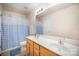 Well-lit bathroom featuring a double vanity, tile flooring, and a shower-tub combination at 7361 Sun Dance Dr, Fort Mill, SC 29707