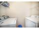 Functional laundry room featuring a washing machine and dryer at 7361 Sun Dance Dr, Fort Mill, SC 29707