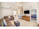 Spacious living room with carpet flooring, staircase, and view to main bedroom at 7361 Sun Dance Dr, Fort Mill, SC 29707