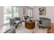Bright living room featuring stylish seating arrangement and modern decor at 7801 Snowden Ln, Charlotte, NC 28270