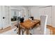 Well-lit office with wooden desk, comfortable chair, and stylish decor at 7801 Snowden Ln, Charlotte, NC 28270