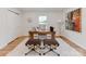 Bright and airy office space with wood desk and stylish accents at 7801 Snowden Ln, Charlotte, NC 28270