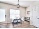 Well-lit dining area with a large window and neutral decor at 8722 Arrowhead Place Ln, Cornelius, NC 28031