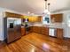Beautiful kitchen featuring stainless steel appliances, granite countertops, and hardwood floors at 898 Sage Field Ln, Lincolnton, NC 28092