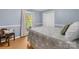 Serene bedroom with a large window, closet, and neutral tones, offering a peaceful retreat for rest and relaxation at 9136 Ladson Rd, Indian Land, SC 29707
