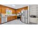Traditional kitchen with stainless steel appliances, ample counter space, and natural light, perfect for home chefs at 9136 Ladson Rd, Indian Land, SC 29707