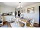 Dining area featuring a wooden table with six chairs, light walls and decor at 976 Pointview Ln, Lincolnton, NC 28092